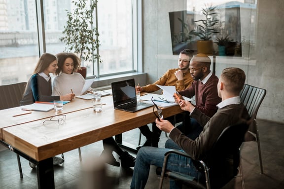 front-view-people-having-meeting-office